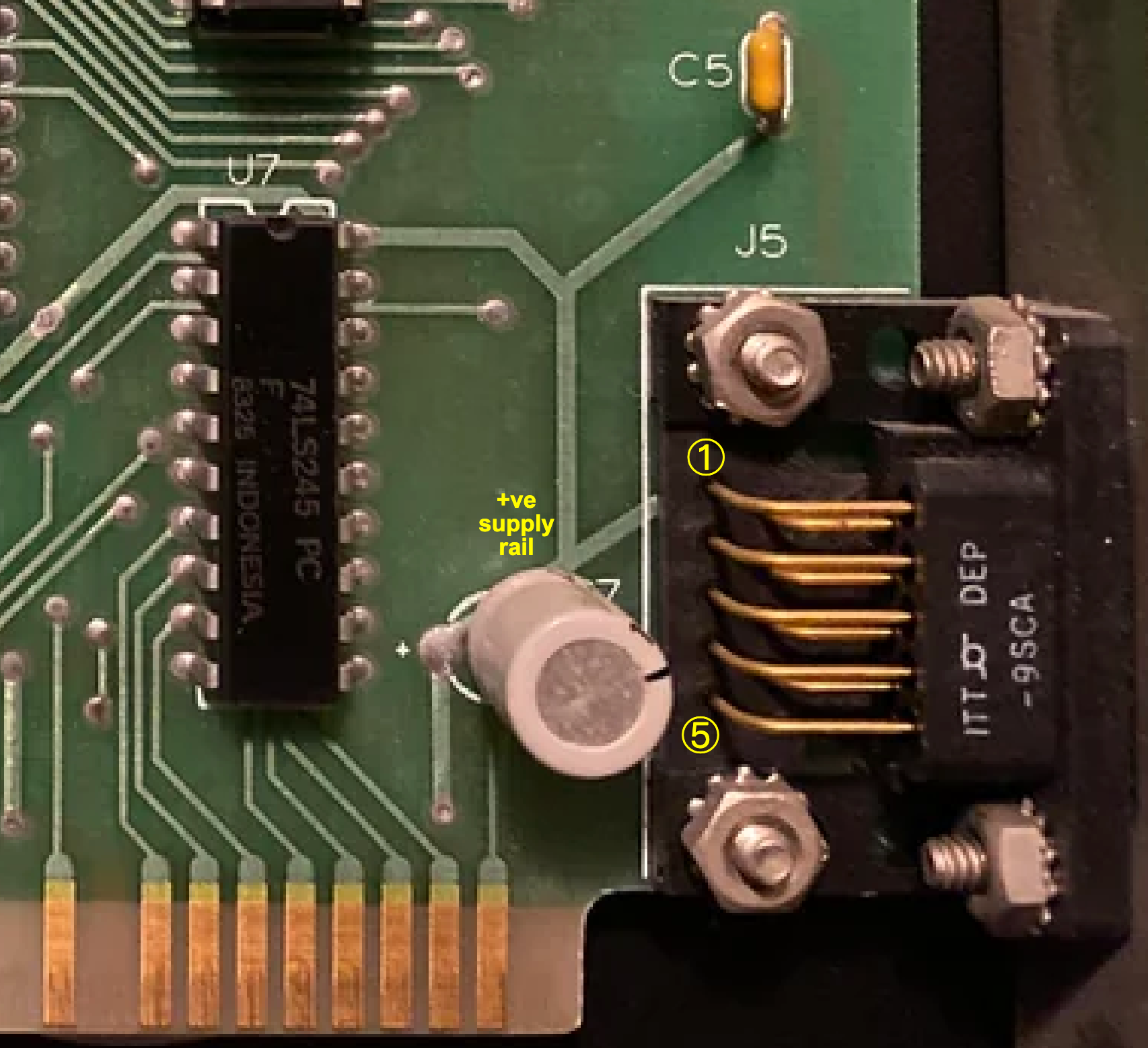 The front side of the bus mouse ISA card shows how the positive rail is very likely connected to pin 1 of the DE-9 socket
